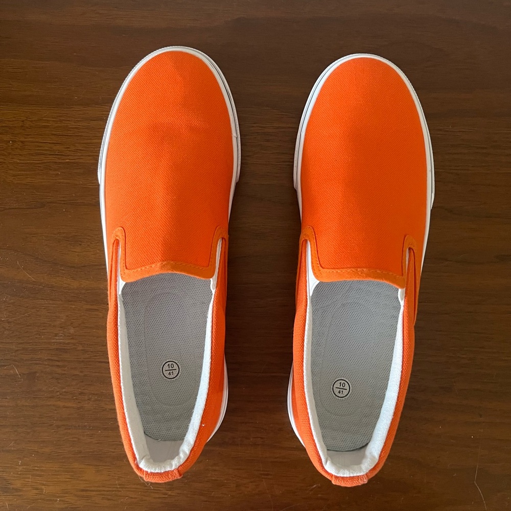 Orange slip-on canvas sneakers